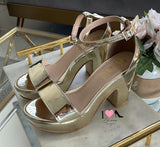 Tacón 318 oro